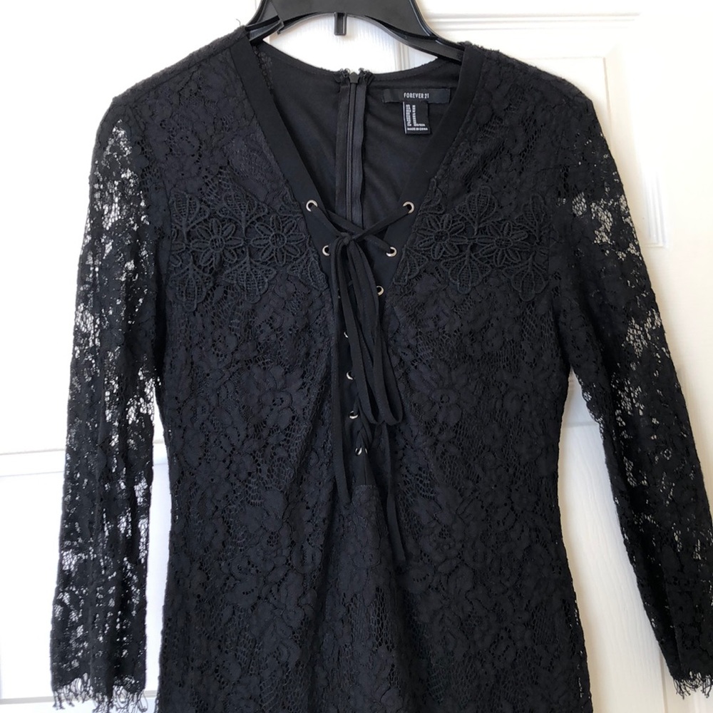 Black lace body con dress